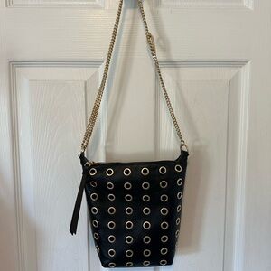 All Saints small black bucket bag w/gold hardware. Adjustable chain strap.